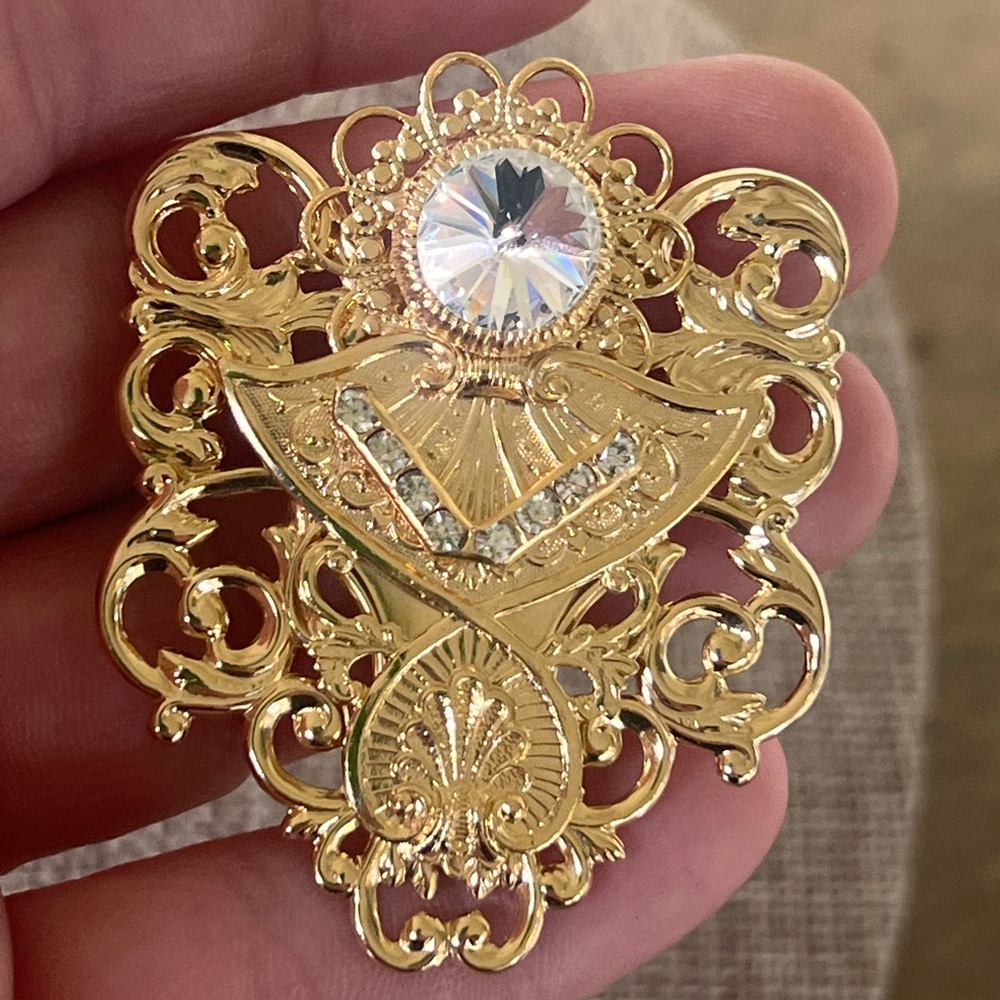 Intricate Gold and Green Brooch